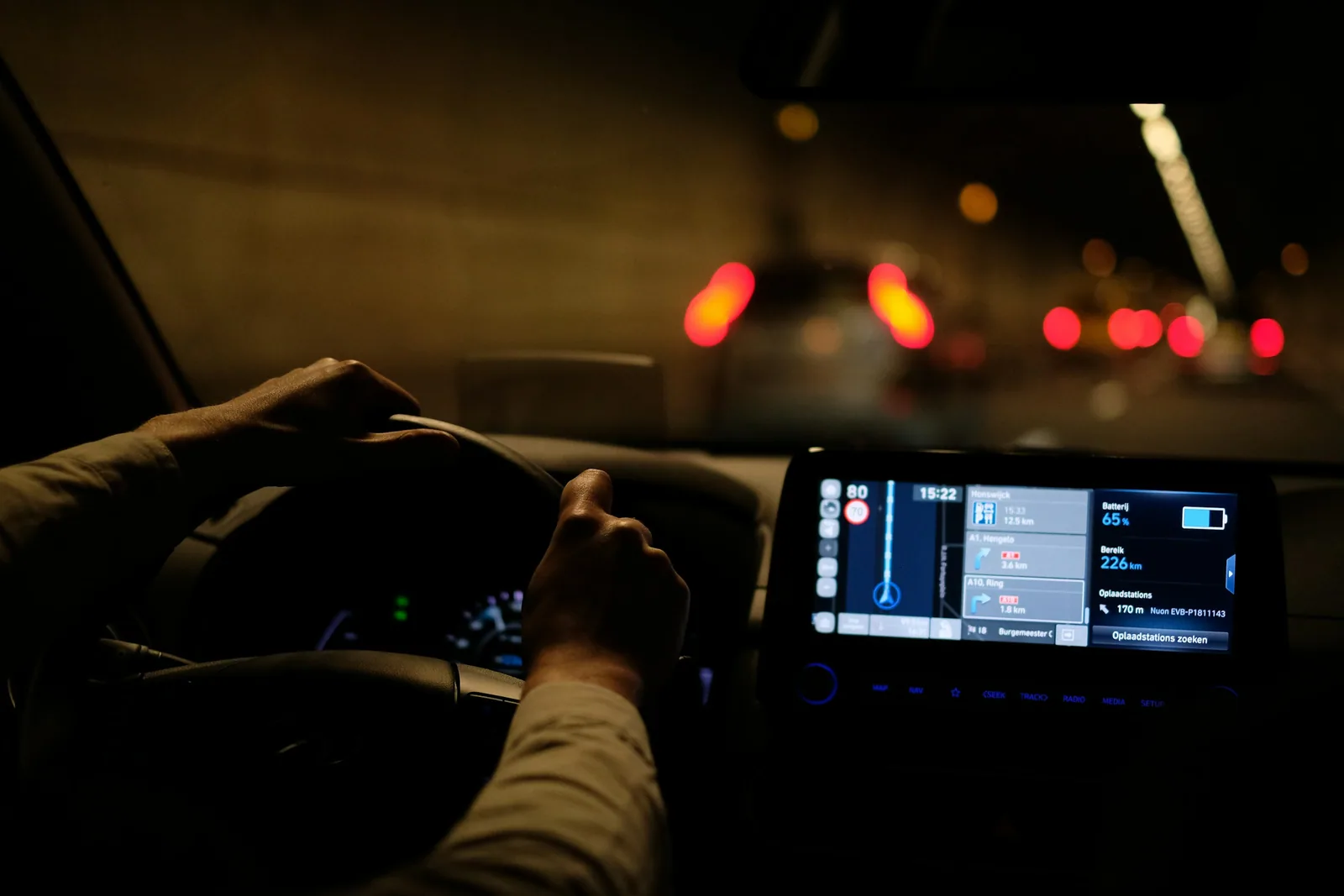Driver at the wheel during an evening lesson